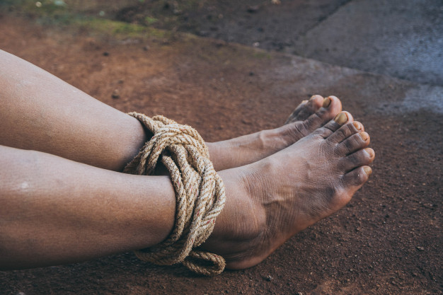 kidnapped-woman-tied-with-rope-abuse-violence-concept_34085-37
